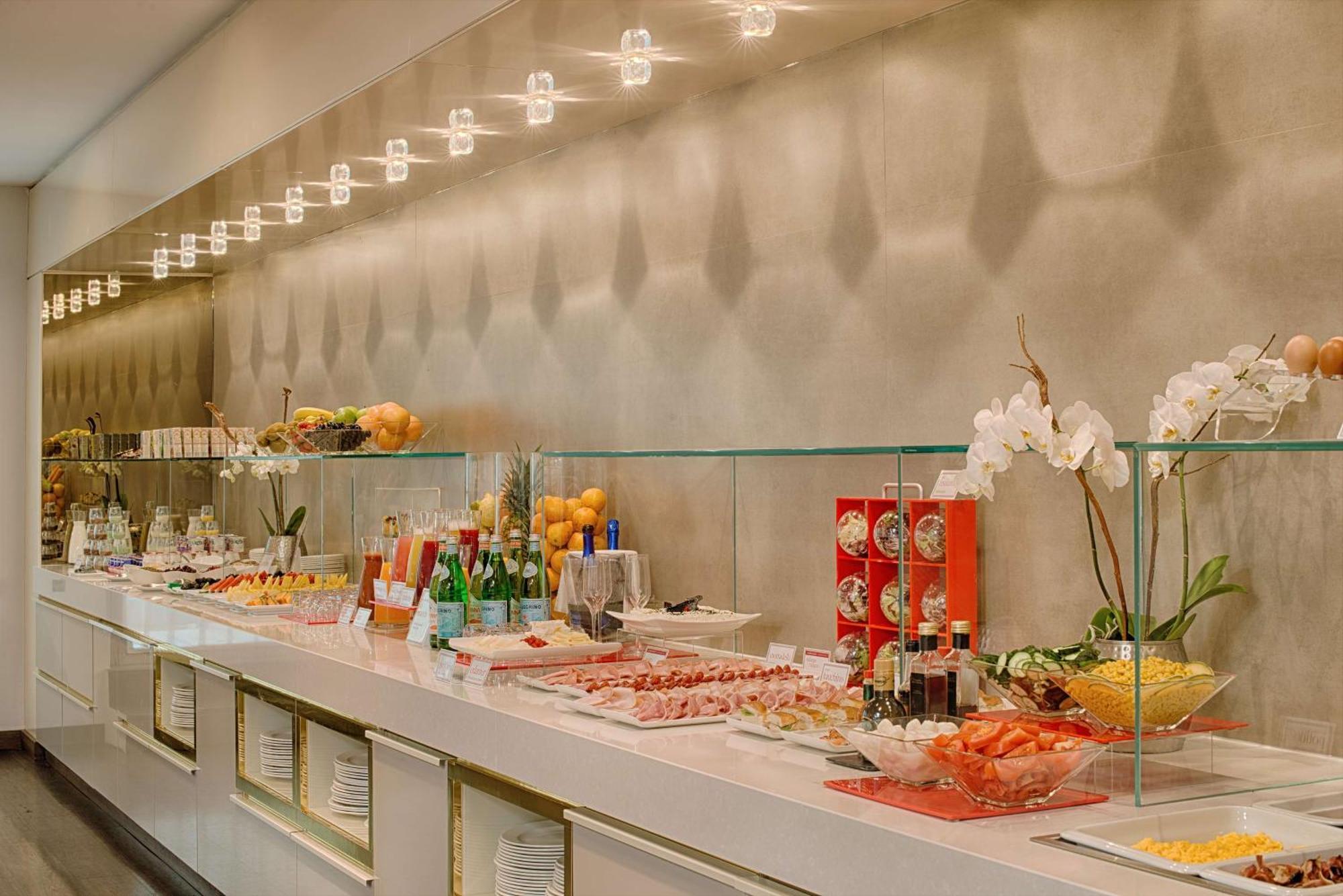 Nh Collection Milano President Hotel Exterior photo A buffet at the airport